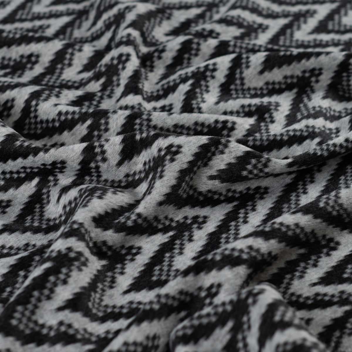 Angerauter Jacquard-Strickstoff Chevron – Schwarz